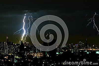 Thunder storm lighting bolt on the horizontal sky and city scape Stock Photo