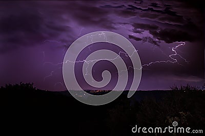 Thunderbolt, lightning bolt in the night sky. Heavy storm with lightning in the night. Night sky full of thunderbolts Stock Photo