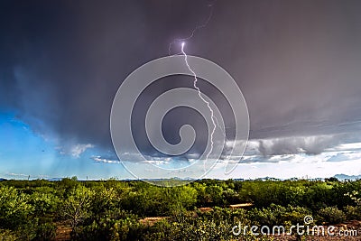 Thunderstorm with lightning and rain falling Stock Photo