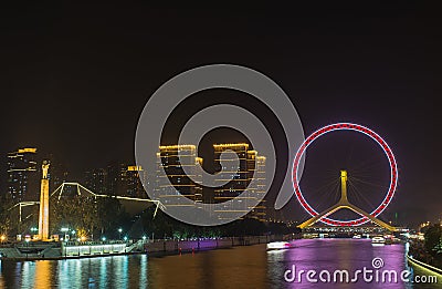 Tianjin ferris wheel,Tianjin eyes, night scene cityscape. Stock Photo