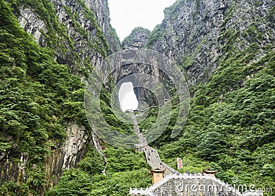 The Tianmen Mountain with a view of the cave Known as The Heaven`s Gate and the steep 999 stairs at Zhangjiagie, Hunan Province, Stock Photo