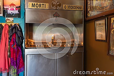 The place to light candles for repose at the entrance to the Church of the Apostles not far from Tiberias city in northern Israel Editorial Stock Photo