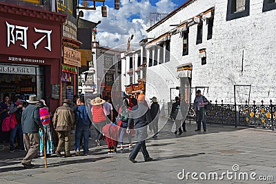 Tibet, Lhasa, China, June, 02, 2018. Buddhists make Kora around the Jokhang Temple Editorial Stock Photo