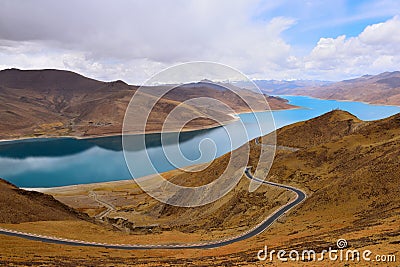 Tibet Yamdrok lake snow mountain road Stock Photo