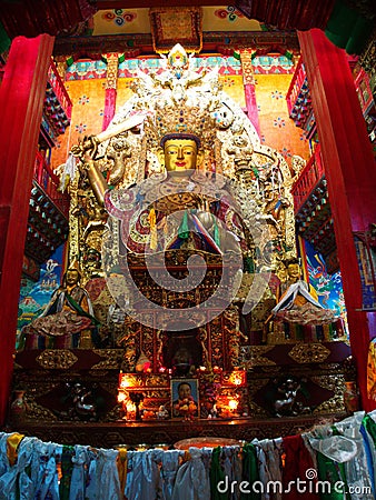 Tibetan Buddha inside Songzanlin Lama Tibetan Temple in Zhongdian or Shangli La City. Travel in Zhongdian City , Yunnan China in Editorial Stock Photo