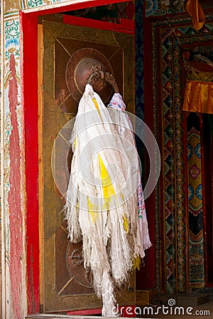 Tibetan door with hada scarf Stock Photo