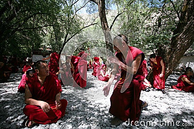 Tibetan Lamas Debating on Buddhist doctrines Editorial Stock Photo