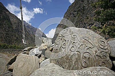 Tibetan mani prayer stones, annapurna Stock Photo