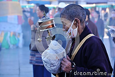 Tibetan pilgrim Editorial Stock Photo