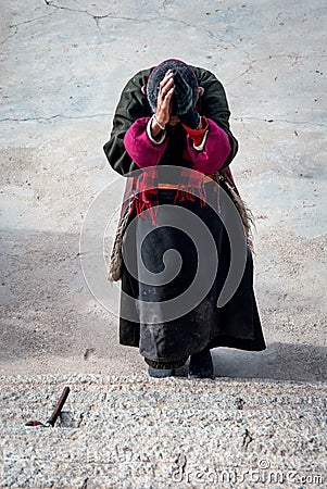 Tibetan pilgrim wears tradition dress Editorial Stock Photo