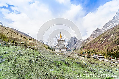 Tibetan Stupa with colorful buddhist prayer flags Stock Photo