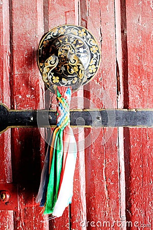 Tibetan style Chinese knot as a bolt and bell Stock Photo