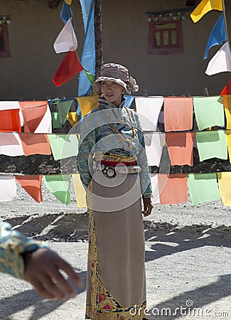 Tibetan Woman dancing Editorial Stock Photo