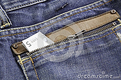 Ticket in jeans Stock Photo