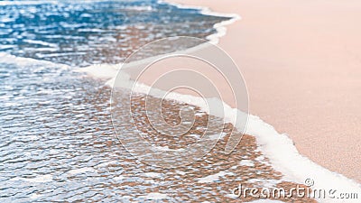 Tidal waves on the coastline of the blue ocean Stock Photo