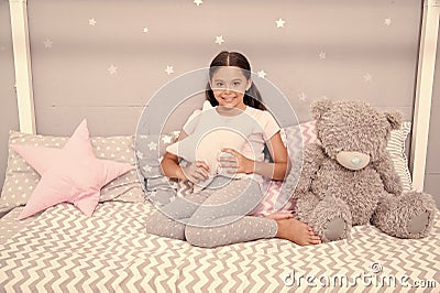 Tidy bedroom. Cute cozy bedroom for small girl. Girl having fun bedroom interior. Childhood concept. Bedroom place relax Stock Photo