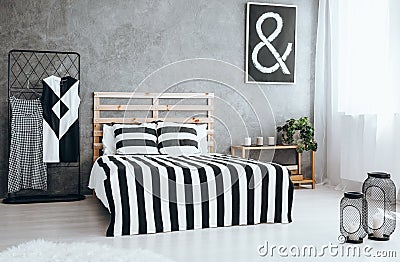 Tidy stylish bedroom Stock Photo