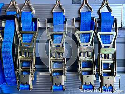 Tie-down straps for securing semi-trailer loads in close-up Stock Photo