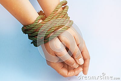 Tied Women Hands, Violence, FreedomConcept, Blue Toned Background, Copy Space Stock Photo