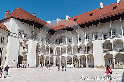 The tiered arcades of Sigismund I Stary`s Renaissance courtyard within Wawel Castle Editorial Stock Photo