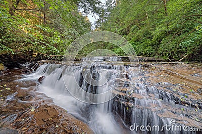 Tiered Cascading Waterfall over Ledge at Sweet Creek Falls Trail Stock Photo