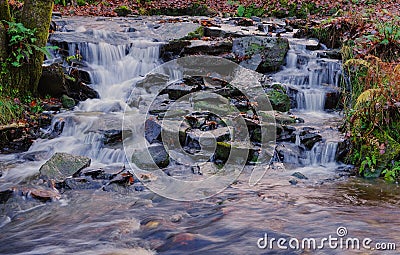 Tiers of rocky waterfall. Stock Photo