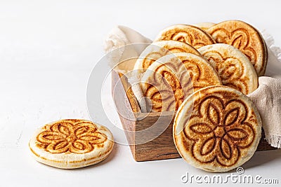 Tigelle or Crescentine, crescente. Thin round breads Stock Photo