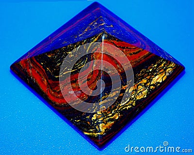 tiger eye pyramid stone Stock Photo