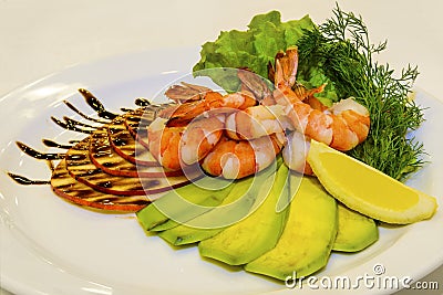 Tiger prawns with fruit and green. Stock Photo