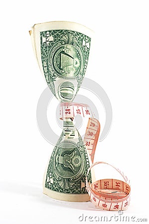 Tight budgeting. Upright money. Stock Photo