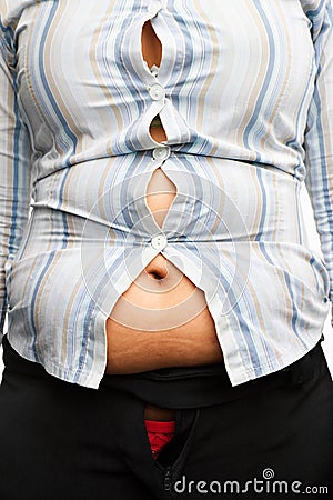 Tight shirt on overweight female body Stock Photo