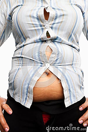 Tight shirt on overweight female body Stock Photo