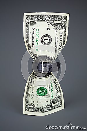 Tighten belt on dollar concept reduced budget Stock Photo