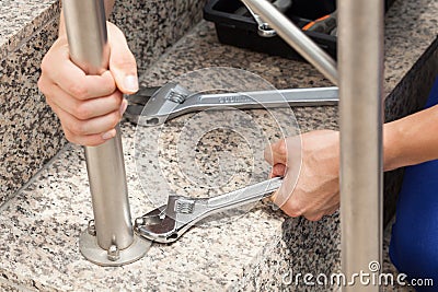 Tightening with wrench Stock Photo