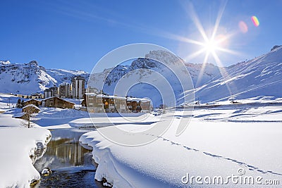 Tignes village with sun Stock Photo