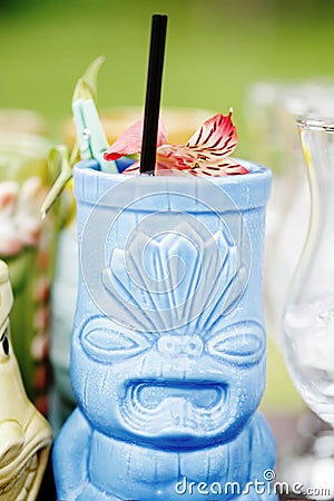 Tiki beach cocktail with orchid flower Stock Photo