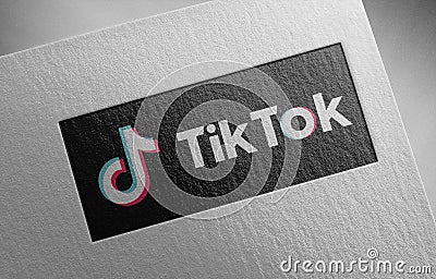 Tiktok-banner-black-3_1 on paper texture Editorial Stock Photo