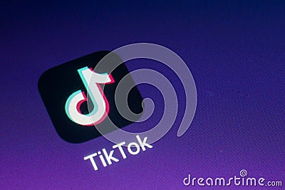 TikTok icon on a smartphone screen. TikTok is an app for creating short lip-sync and comedy videos Editorial Stock Photo
