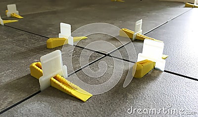 Tile Aligning Spacer Leveling System Stock Photo