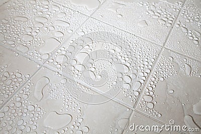 Tiled Floor and water droplets Stock Photo