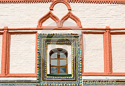 Tiled window trim on the east side of the Priory Corpus Stock Photo