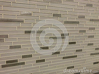 Tiles made of glass installed on the wall as decoration or kitchen backsplash Stock Photo