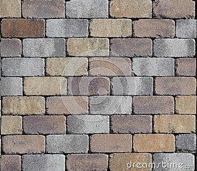Tiles for outdoors pavements, also used as brick for surrounding wall. Stock Photo