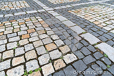 Tiles texture. Pattern of ancient german cobblestone in city downtown. Little granite paving stones. Antique gray pavements Stock Photo