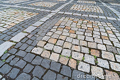 Tiles texture. Pattern of ancient german cobblestone in city downtown. Little granite paving stones. Antique gray pavements Stock Photo