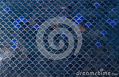 Tiles wall. The dark blue navy tiles wall with under the sea ins Stock Photo