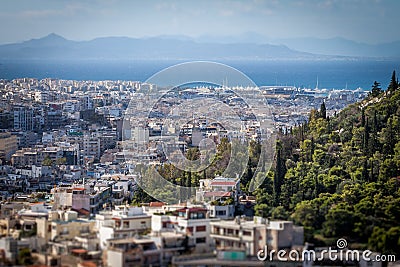 Tilt shift of panorama of Athens, with the sea in the background Stock Photo