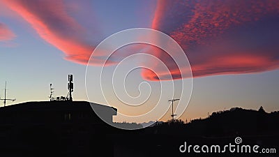 Tilt Up of Unusual Weird Sky with Amazing Pink Orange Clouds Stock