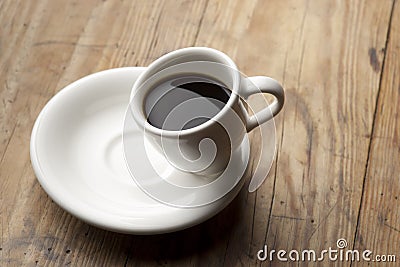 Tilted coffee cup. Stock Photo