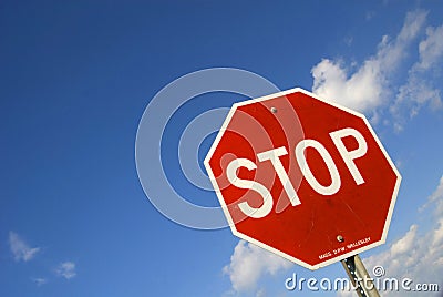 Tilted Stop Sign Stock Photo